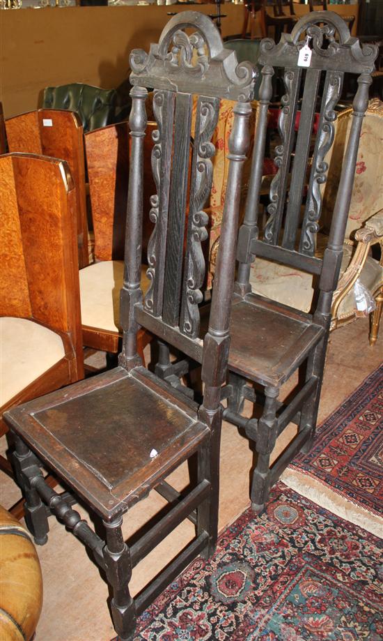 Pair of Carolean style oak hall chairs